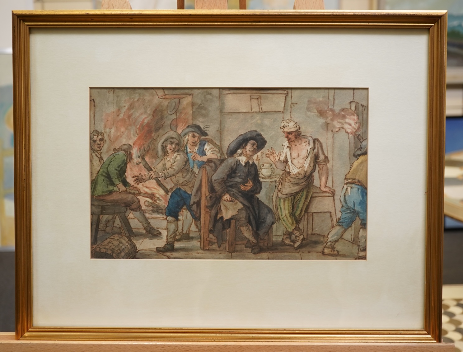 Circle of Thomas Rowlandson, (1756-1827), A group of men lighting torches in an interior